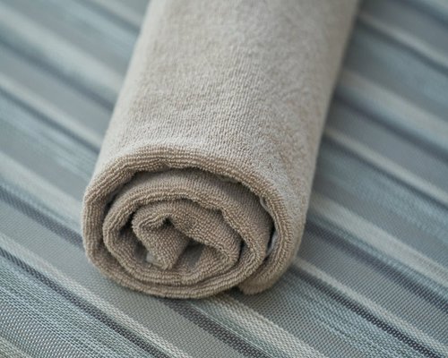 A soft cotton towel folded neatly
